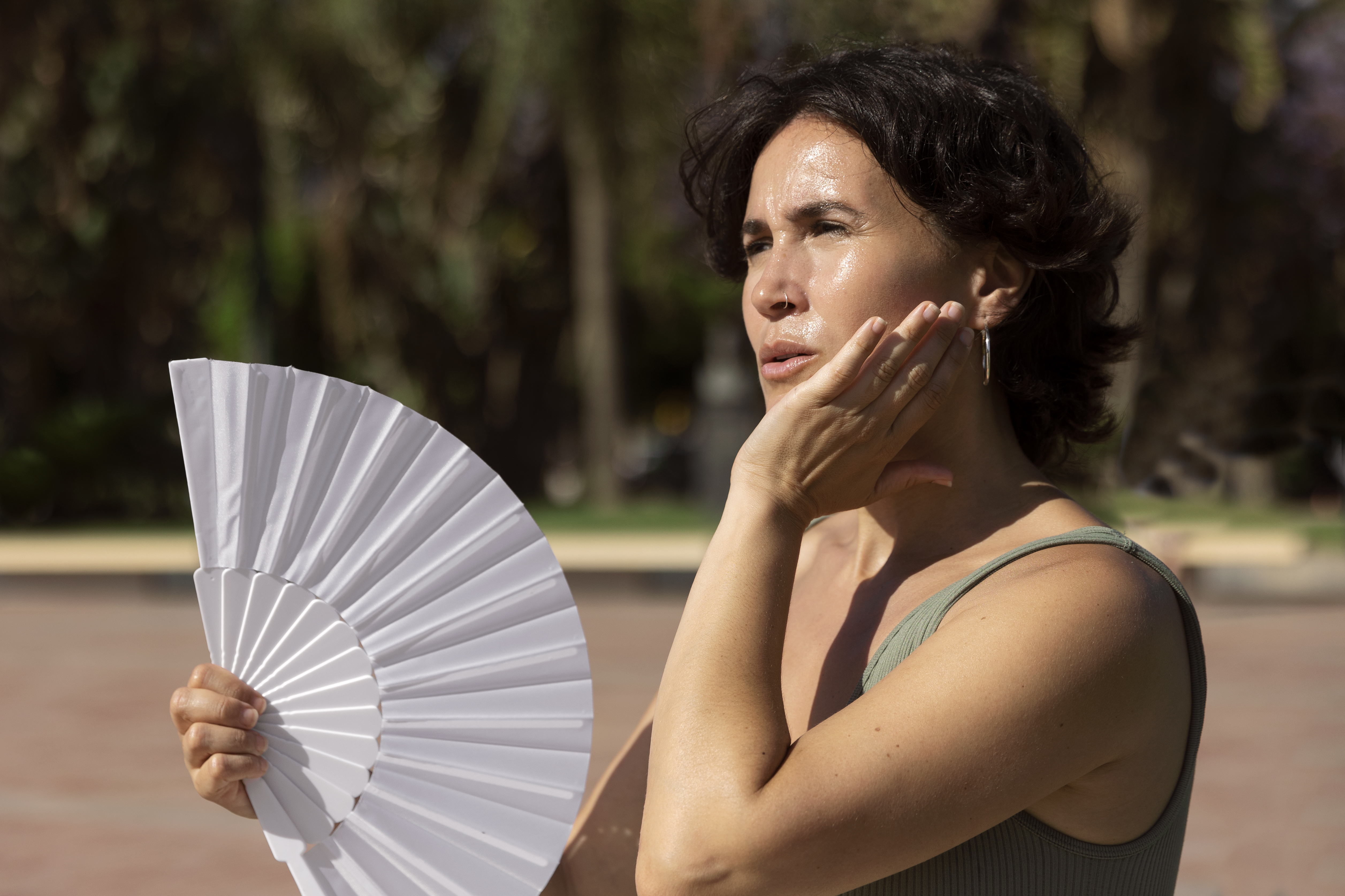 elder-woman-struggling-with-high-temperature (2).jpg